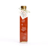 Autumn leaf maple syrup bottle filled with Amber Rich Taste maple syrup from Carman Brook Farm.