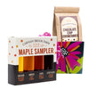Flower gift box with a four pack sampler of maple syrup and a pancake mix.