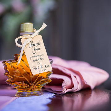 Make an elegant statement  with our party favors for any theme wedding. Maple syrup favors go especially well with any color including this rose theme table layout.