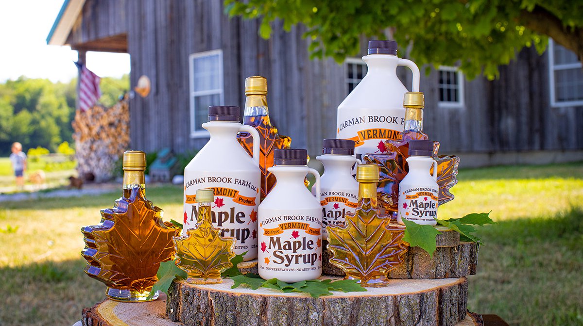 The Carman Brook Farm presents maple syrup they produce on the family farm in both plastic and glass containers from our maple sugarhouse.