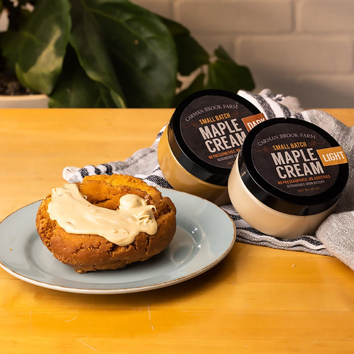 Maple cream spread on donuts.