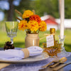 Add a touch of class to your back yard wedding with a transluscent bottle of Vermont maple syrup wedding favor.