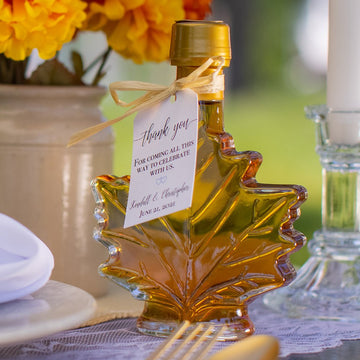 Upgrade your fall wedding theme with a party favor glass bottle of real Vermont maple syrup.