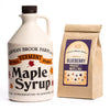Half gallon of maple syrup with blueberry pancake and waffle mix.
