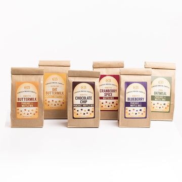 The entire lineup of pancake and waffle mixes that Carman Brook Farm offers. These include: Buttermilk, Blueberry, Chocolate Chip, Vegan, and Gluten Free. We also offer a Cranberry Spice Muffin Mix as well.