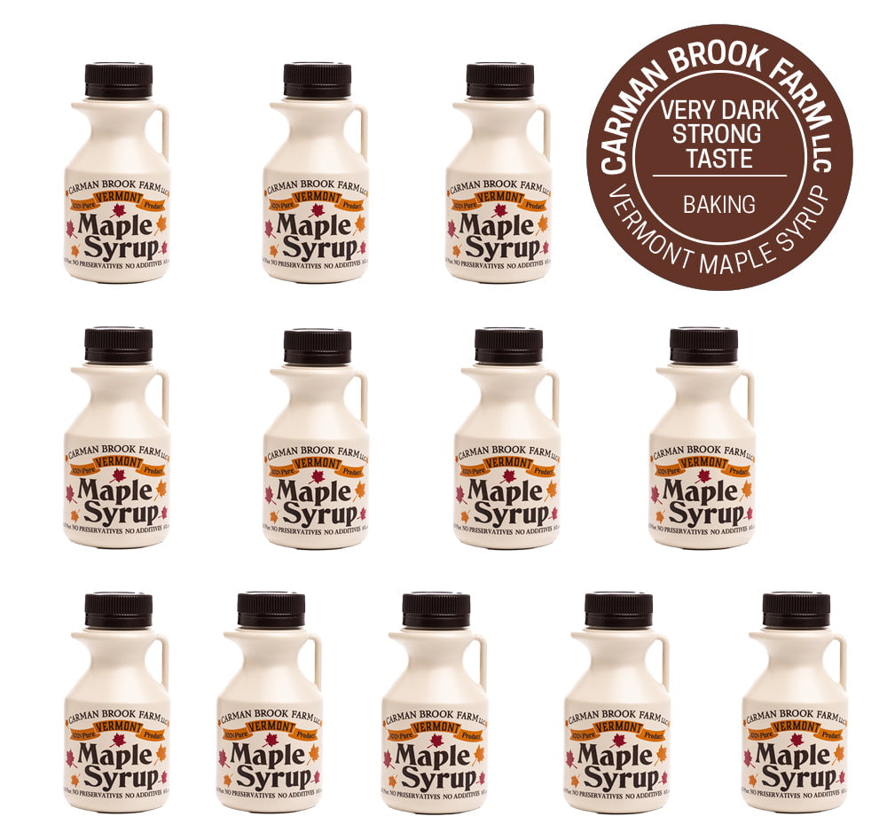 Showing 12 half pints of maple syrup with the emblem for the grade of Very Dark Strong Taste/Baking.