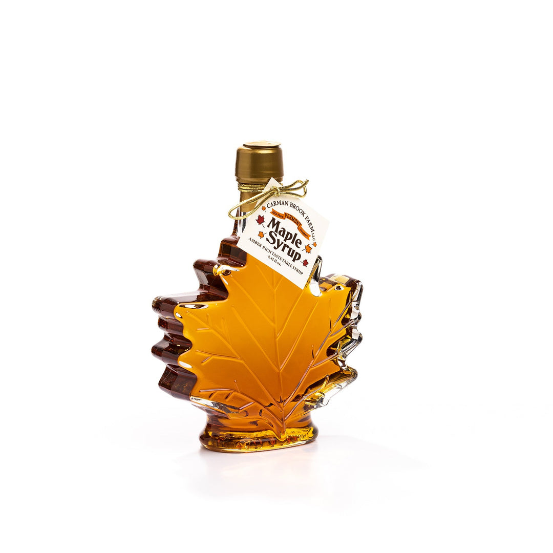 Large Vermont maple syrup leaf bottle filled with Amber Rich Taste syrup.