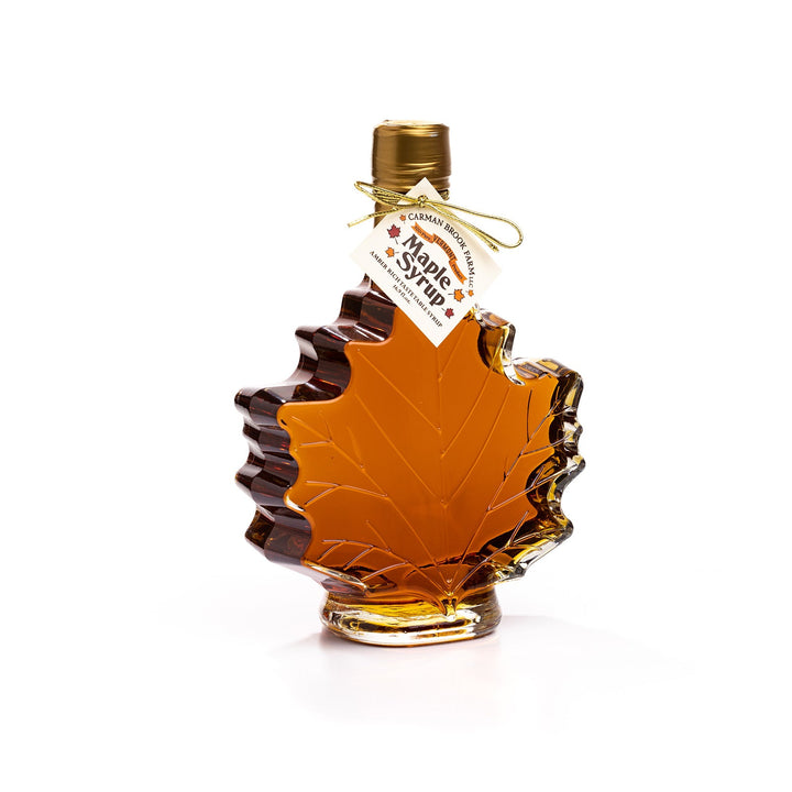 X-Large Vermont maple syrup leaf bottle in elegant glass.