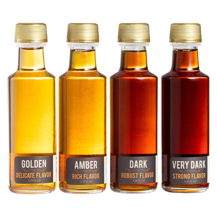 Set of four Vermont maple syrup wedding favors showing all grades from golden to very dark.