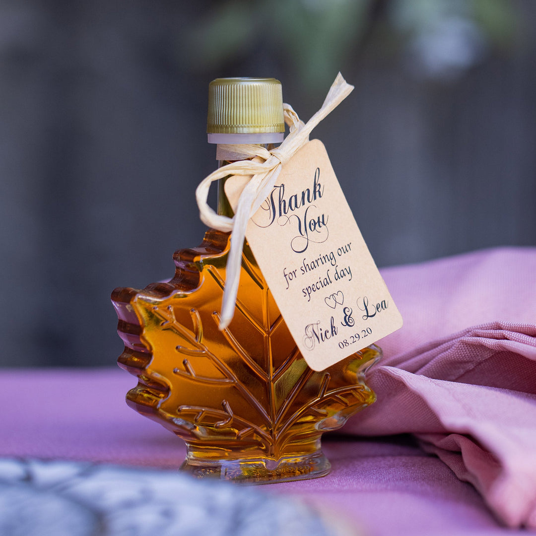 Maple syrup wedding favor displayed at a rustic Vermont wedding place setting.