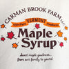 Logo on the front of the Carman Brook Farm t-shirt.