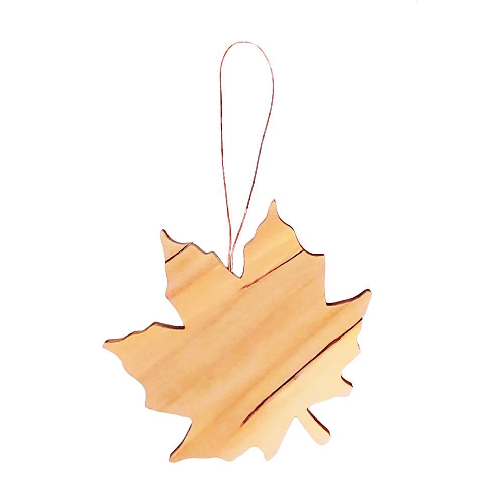 Spalted maple leaf ornament with copper wire hanger.